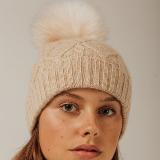 Beige cashmere hat with pompom