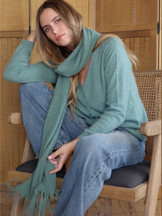 Green fringed knitted scarf
