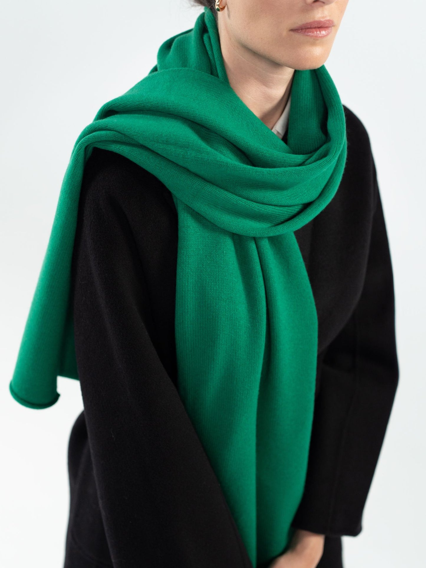 Large green knitted scarf
