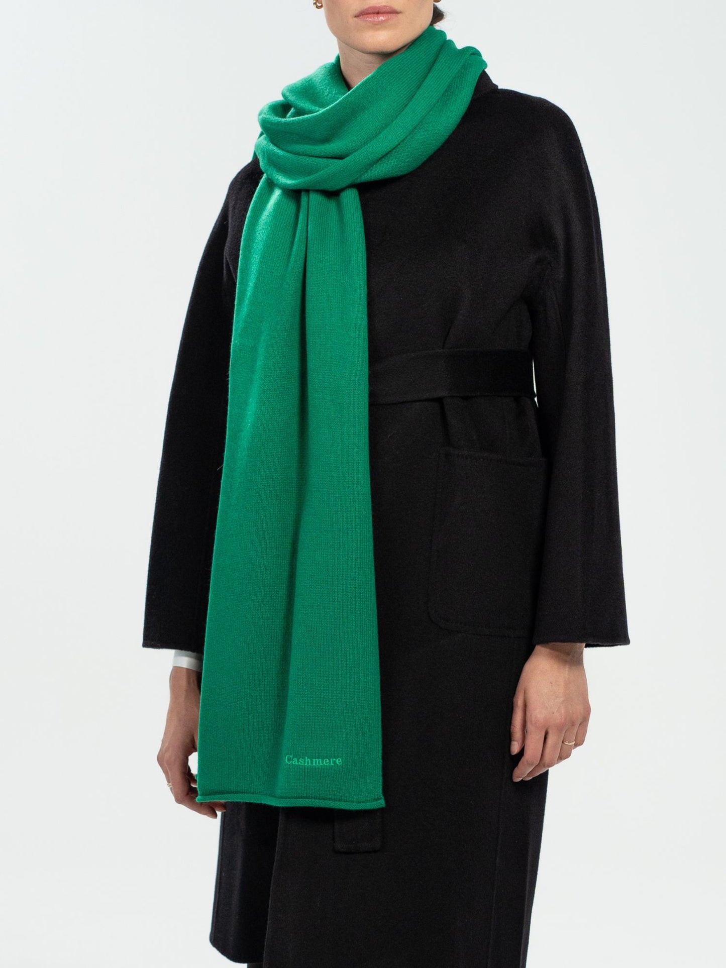 Large green knitted scarf